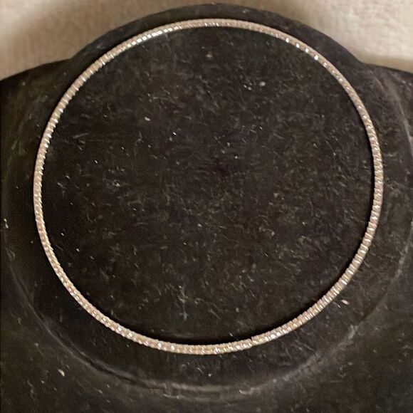 7.5” stackable polished silver tone bangle bracelet w/32 prong set crystals - Picture 9 of 12